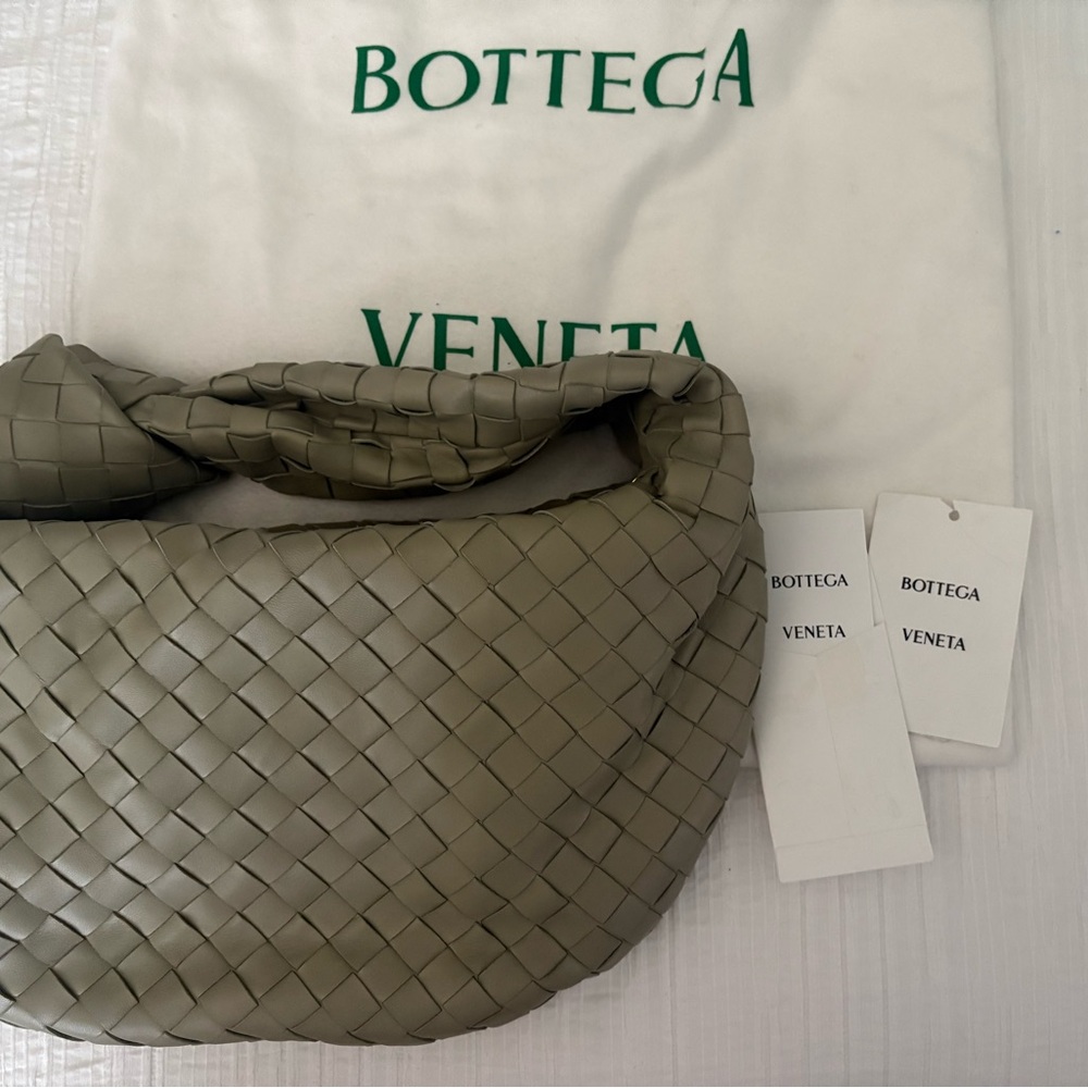 Bottega Veneta White Dust Bag with Gold hardware.